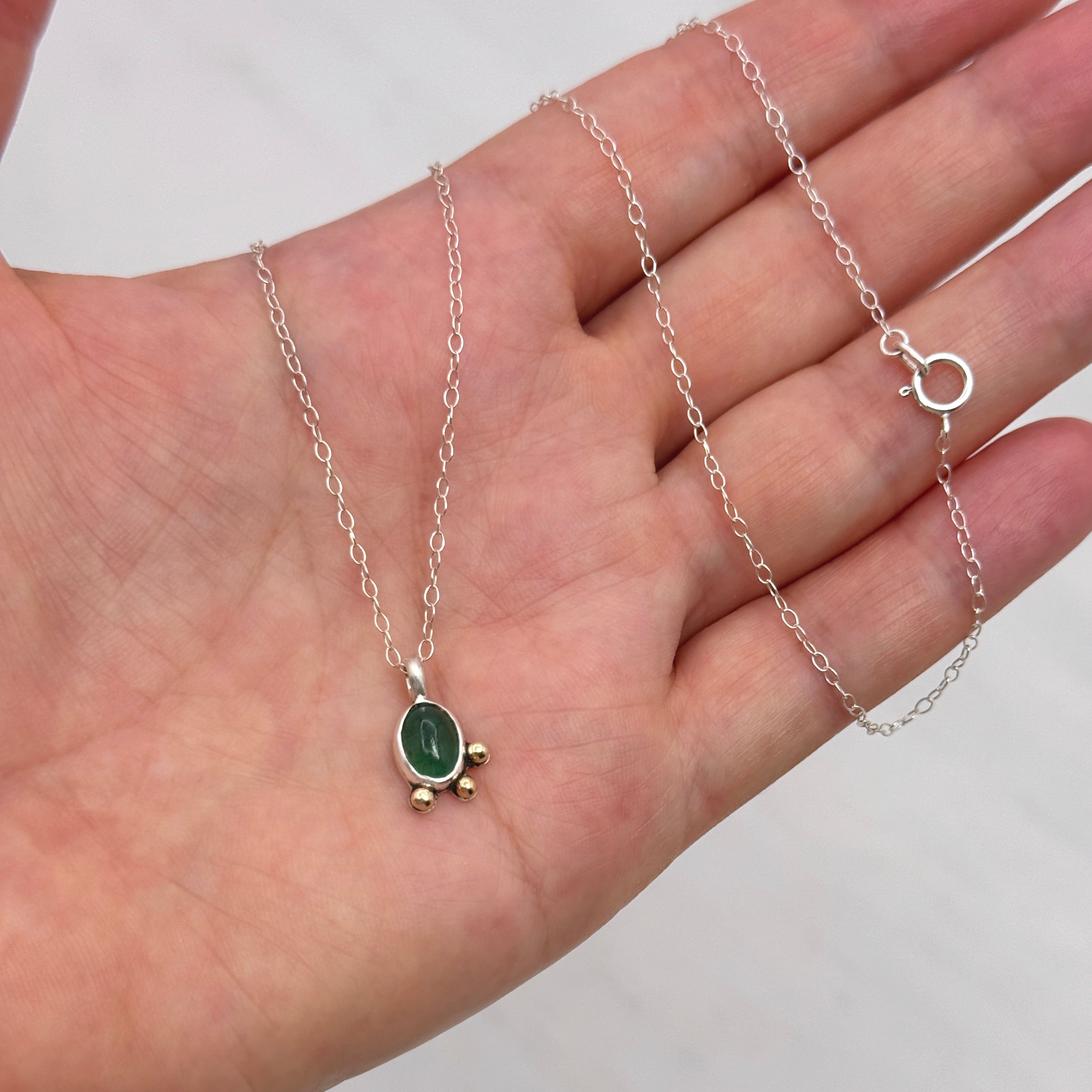 Emerald Silver Pendant With 14K Gold Accents