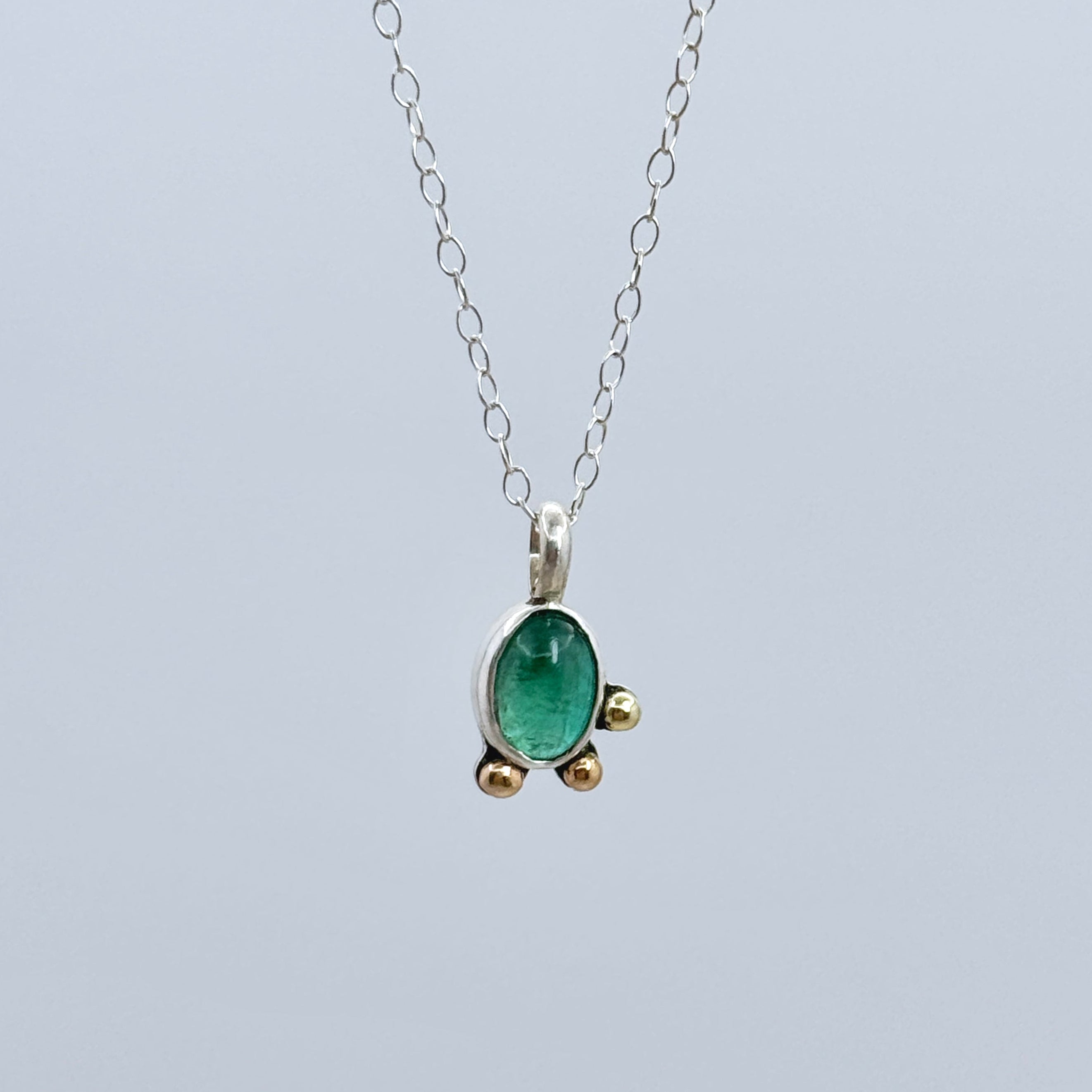 Emerald Silver Pendant With 14K Gold Accents