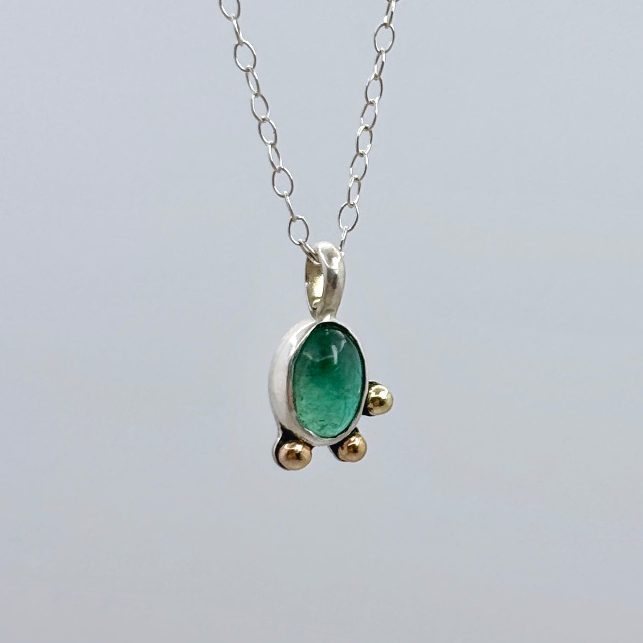 Emerald Silver Pendant With 14K Gold Accents
