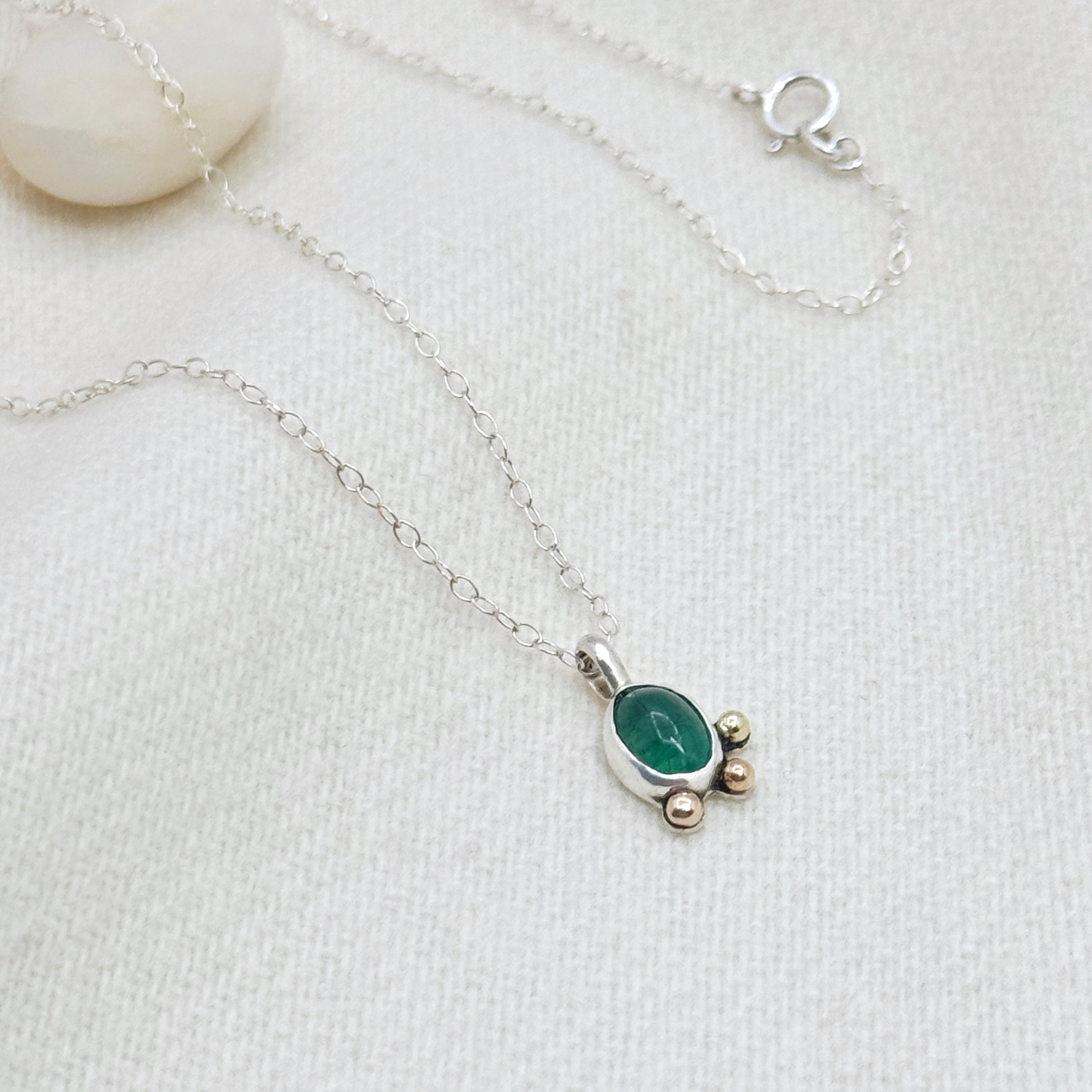 Emerald Silver Pendant With 14K Gold Accents